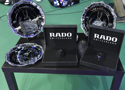 Half width trophy and rado watch